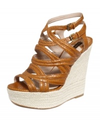 Stand tall in the Sibey wedges by Joan and David. They're ultra strappy with a tall, yet walkable wedge.