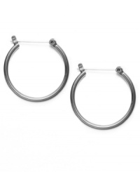 Chic and classic. What could be a better complement for your casual wardrobe than simple yet sleek hoop earrings? Style&co.'s version is crafted in hematite tone mixed metal and equipped with a secure hinge closure. Approximate diameter: 1-1/10 inches.