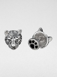 Wild about style, these antiqued sterling silver cuff links are crafted in a tiger's head and paw design.Sterling silverPaw-shaped backAbout .67 diam.Made in USA