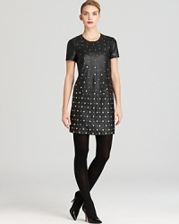 This studded leather French Connection dress offers an uptown meets downtown elegance for party-ready perfection.