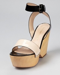 In minimalist hues, these modern wedges from Jean-Michel Cazabat offer a versatile palette on an edgy silhouette.