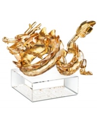 Honor the most important sign of the zodiac in exquisite Swarovski crystal. The all-powerful dragon glistens in meticulously crafted gold crystal with piercing red eyes. A symbolic gift for family and friends, on a base engraved with both English and Chinese seal script.