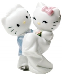 Kitten no more, Hello Kitty is the blushing bride in this adorable collectible. Handcrafted in Lladro porcelain with intricate glazed detail, the too-cute cats make a fun cake topper, too!