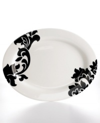 Bold design and uncompromising quality make the Lisbon oval platter easy to love. Embrace stenciled black florals or mix and match with equally fresh Banded dinnerware, also by Martha Stewart Collection.