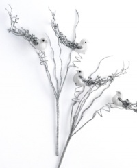 Glistening beauty. These precious birds nest upon your tree in shimmering silver and white sparkles for a festive air. Twist and bend the branches to get the perfect setup.