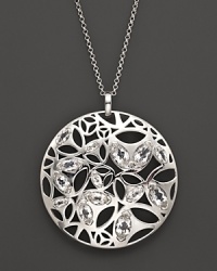 A bold sterling silver pendant glistening with faceted rock crystals. By Di MODOLO.