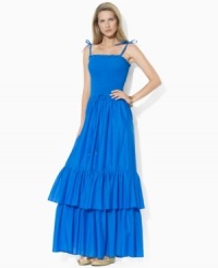 Rendered in airy cotton voile for a full, floaty silhouette, Lauren by Ralph Lauren's graceful maxi dress is designed with a flattering smocked bodice and a two-tiered ruffled hem for whimsical appeal.