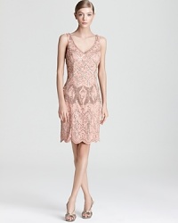 Shoulder-to-hem embellishments make an unforgettable statement on this Sue Wong dress.