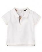 Sophisticated little gents will look ever-so-charming in the iconic Burberry Palmer polo.