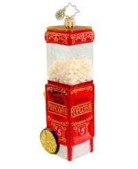 Skip popcorn balls and garland for an ornament that's literally popped to perfection. Advertising the hot, fresh movie theater favorite, it's hard to believe the vintage-style cart is handcrafted in pure glass. By Christopher Radko.