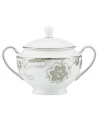 A fine vintage. The Paisley Terrace sugar bowl elevates even the most elegant settings with breezy florals grounded in graceful white porcelain. With luxe platinum banding to complement the rest of the Lenox dinnerware collection.