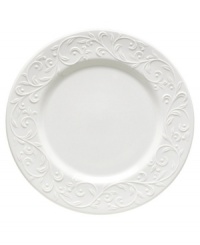 Dressed in elegant white-on-white with an embossed vine motif and interior glaze, the dinner plates from Lenox's Opal Innocence Carved collection of dinnerware and dishes get your table set for refined dining every day.