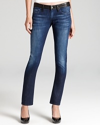 Edgy rock star style defines these cool low rise jeans from Citizens of Humanity--a leather waistband adds an unexpected twist to these too-cool-for-school skinnies.