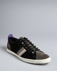 An upbeat sneaker in color-block suede spruces up your everyday attire and reveals your lighthearted personality.