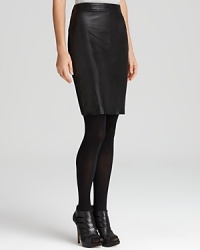 Streamline your 9-to-5 style with a luxe leather DKNY skirt accentuated with vertical seaming for a flawless silhouette.