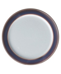 A true gem, the Amethyst wide-rimmed tea plates are simply glazed, but boldly hued, in deep indigo and crisp white from Denby's collection of dinnerware. The dishes can embrace their luxe color alone or they can be paired with the playful dots of Amethyst Stone for a well-balanced and uniquely customized table setting.