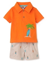 Your aspiring beach bum will love the look and feel of this cute cotton set. The polo sports surf board and palm tree embroidery and the short has a schiffli surf board pattern.