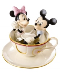 Take a ride back to classic carnival fun with this charming Disney figurine featuring Mickey Mouse and Minnie Mouse. Accented with 24-karat gold and measures 6.