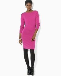 Crafted in merino wool, a timeless sweater dress is updated with a boat neckline and chic dolman sleeves.