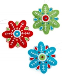 Snowed in. Snowflakes sewn in soft felt with elements of bright blue, green and red add well-crafted whimsy to your Christmas tree.