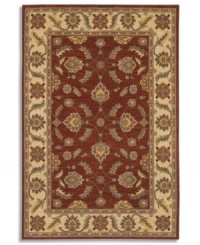 Covered in graceful floral imagery, this area rug will fill your room with color. The Sedona Henna rug is woven from New Zealand worsted wool that has been specially twisted and space-dyed to replicate the look of a hand-woven Peshawar rug. In deep red with a warm beige border, this magnificent piece creates an inviting space for gatherings in your home.