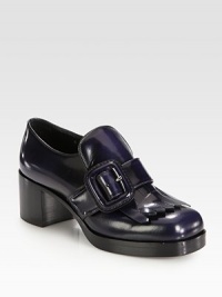 A large buckle tops this moccasin-inspired oxford silhouette, rendered in glossy patent leather. Stacked heel, 2¼ (60mm)Stacked platform, ½ (15mm)Compares to a 1¾ heel (45mm)Patent leather upperAdjustable buckle strapLeather lining and solePadded insoleMade in ItalyThis style runs small. We recommend ordering one half size up for a standard fit. 