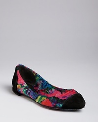 B Brian Atwood makes these pointed toe flats flatly fashionable in a riot of neon color contained by neutral cap toes.