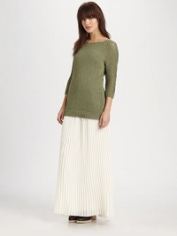 Ultra-soft, breathable crocheted fabric is a casual-chic wardrobe must-have. BoatneckWide, semi-sheer crochet knit along neckline and sleevesLong dolman sleevesRibbed hem and cuffs80% cotton/20% linenDry cleanImportedModel shown is 5'10 (177cm) wearing US size Small.