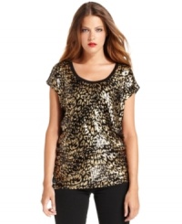 MICHAEL Michael Kors delivers a double dose of shine with this top, featuring a metallic animal print and sequins throughout.