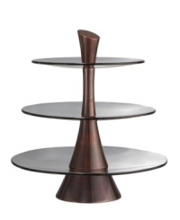 Crafted of alloy and finished in beautiful bronze, this Heritage three-tiered server from Nambe's collection of serveware and serving dishes features unique smoked glass accents on each tier.