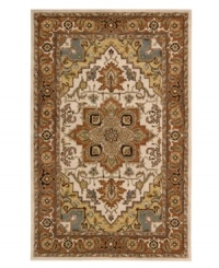 An elegant pattern, this Nourison rug features a design that melds classic Persian motifs with chic, natural color. With its opulent 100% natural wool construction, this yarn-dyed and meticulously hand-tufted rug offers a beautiful accent to traditional home décor. (Clearance)