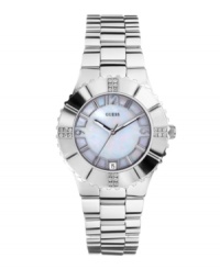 A mother-of-pearl dial and crystal accents punch up a classic timepiece by GUESS.