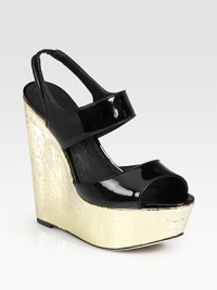 Sky-high self-covered wedge with a glossy patent leather upper and stretchy slingback strap. Self-covered wedge, 5½ (140mm)Covered platform, 2 (50mm)Compares to a 3½ heel (90mm)Patent leather upperLeather lining and solePadded insoleImported