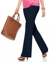 Bright-colored tops pop against the sleek silhouette of MICHAEL Michael Kors' petite pants.