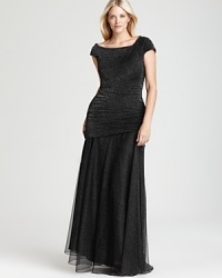 With a subtle, understated sparkle, Tadashi Shoji's dazzling dress lends a brilliant look to the evening's events.