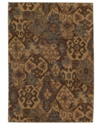 Abstract designs inspired by ancient tribal artwork are arranged in a dazzling way upon this Kulshan area rug from Karastan. Woven of rich New Zealand wool for supreme softness and lasting durability.