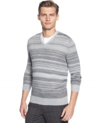 Layer me over a t-shirt and you'll create a relax pull together look with this striped merino v-neck sweater by Calvin Klein.