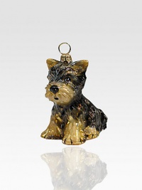 Fluffy puppy in mouth-blown glass is handpainted by Polish artisans with intricate detail. Handpainted glass Each ornament takes 7-10 days to complete Arrives in gift box ideal for giving or storing 1½W X 2½H X 2D Handmade in Poland 