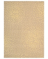 A chic starburst pattern adorns this stylish rug from the Capri collection, offering a unique focal point for any room. Woven of a blend of fine wool with Nourison's signature light-reflecting Luxcelle™ fibers, the rug's soft beige shade and luminous appearance complement a range of decors. (Clearance)