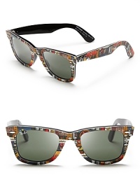 So rock and roll: these classic Ray-Ban Wayfarer sunglasses hit the right note in a guitar print.