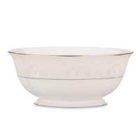 Laced with vintage elegance, the Chapel Hill serving bowl features a modern silhouette and prim doily pattern with platinum trim. Fine bone china from kate spade new york ensures a head-turning table setting for dinner parties, holidays and more.