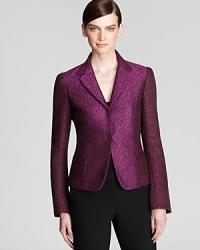 A careerist essential gets a contemporary update as richly-hued tweed and flared cuffs infuse a classic Elie Tahari tweed jacket with modern inspiration.