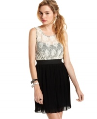 Miss Chevious joins a lace top with a skirt of fine pleats on a dress that's all about layered elegance!