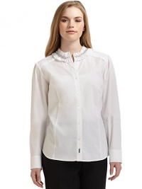 THE LOOKRuffled collar with chain detailButtonfrontButtoned cuffsLogo hardware at placket bottomShirttail hemTHE FITAbout 26 from shoulder to hemTHE MATERIAL76% cotton/21% nylon/3% elastaneCARE & ORIGINMachine washImported