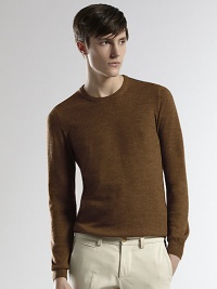 A smooth, streamlined pullover sweater knitted in a rich Italian wool.CrewneckRibbed knit collar, cuffs and hemWoolDry cleanMade in Italy