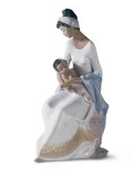 A doting mom gazes into the eyes of her newborn child in this heartwarming collectible, handcrafted in Lladro porcelain. Perfect for a new moms or Mother's Day.