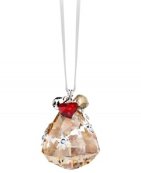 On a festive note. The bell-shaped Golden Shadow ornament sparkles in faceted Swarovski crystal with elaborate silvertone accents. Delicate, dangling charms – including a real metal bell – add extra dazzle.