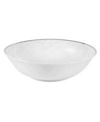 The essence of elegance, this Parchment Pearl vegetable bowl is edged with a delicate scroll design and polished platinum to complement the classic Mikasa dinnerware collection.