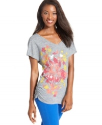 Get into the groove with a cute petite tunic top for workout or play from Style&co. Shimmering studs add a touch of a glam to a pretty print.