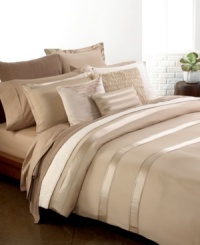 It's all in the details! The Essentials Vapour duvet cover from Donna Karan adds elegance and comfort to your bed with perfectly tailored alternating rows of shiny and matte silk charmeuse. Button closure.